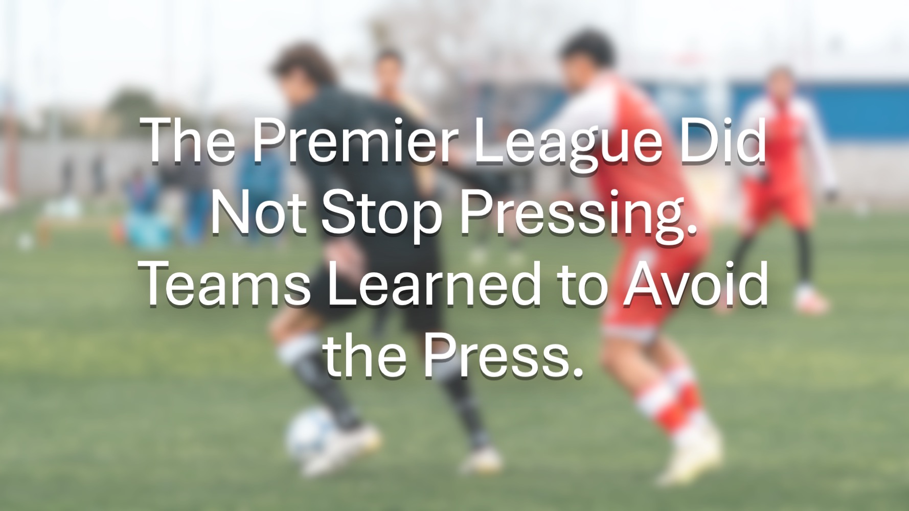 Football players being pressed hard while retaining possession.